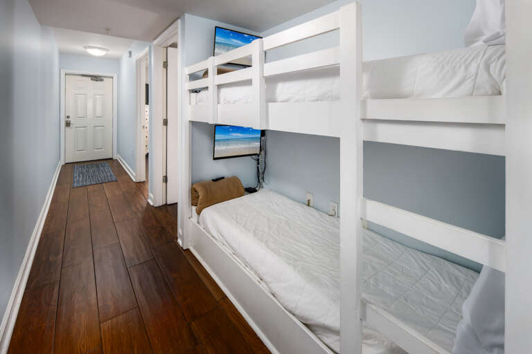 Each bunk has a TV.