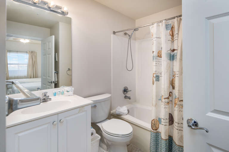 Featuring a shower / tub combo.