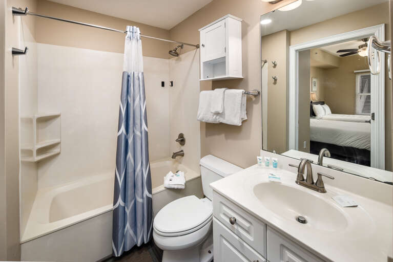 Shower & tub combo in the third bathroom 