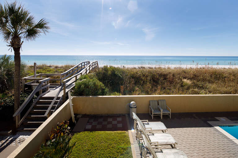 You can rinse off the sand in the shower located on the private beach access 