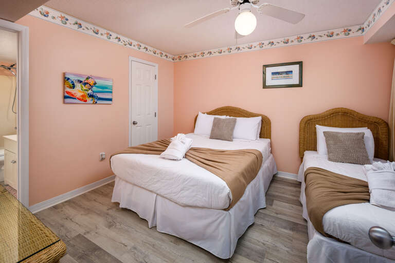 Contains a queen and twin side bed