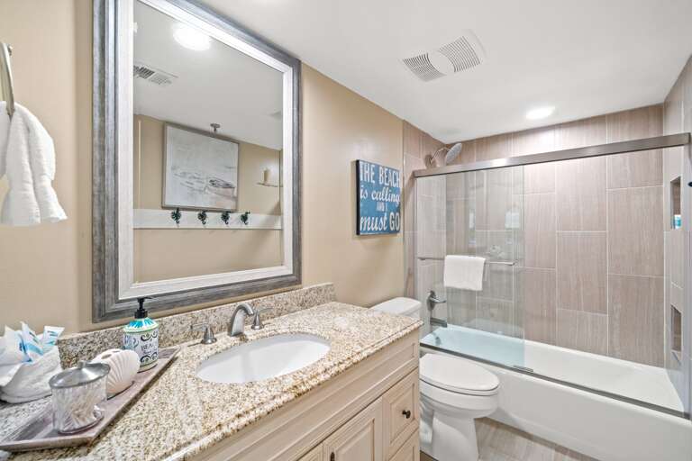 The second full bath equipped with a tub/shower combo.