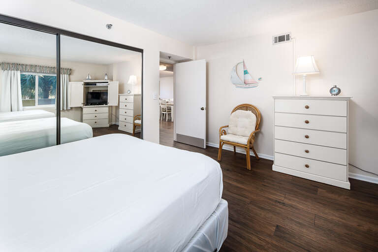 The guest bedroom also features a flat screen TV and mirrored closet doors and LOTS OF SPACE.