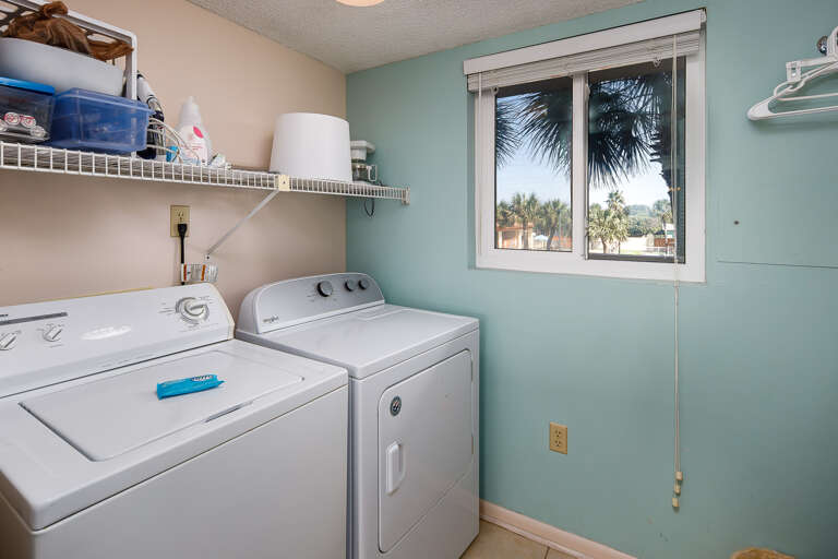 Located just beyond the kitchen, a full size washer and dryer are available for your convenience.