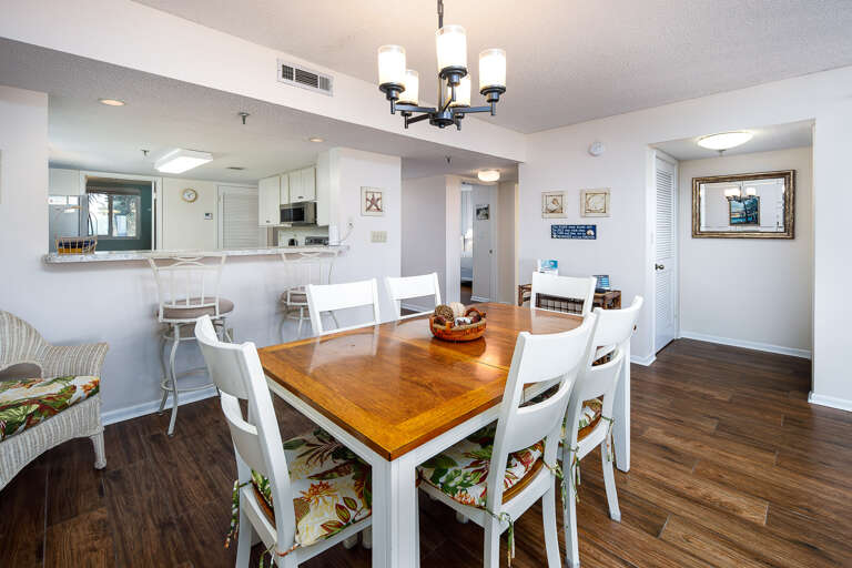 Dining area with table for 6 to afford room for all and gulf front dining.