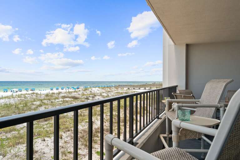 The balcony, which can be accessed from the living room and the master bedroom, is quite large for a 2BR unit - about 30 feet long. It also has seating out here for up to 8 guests!