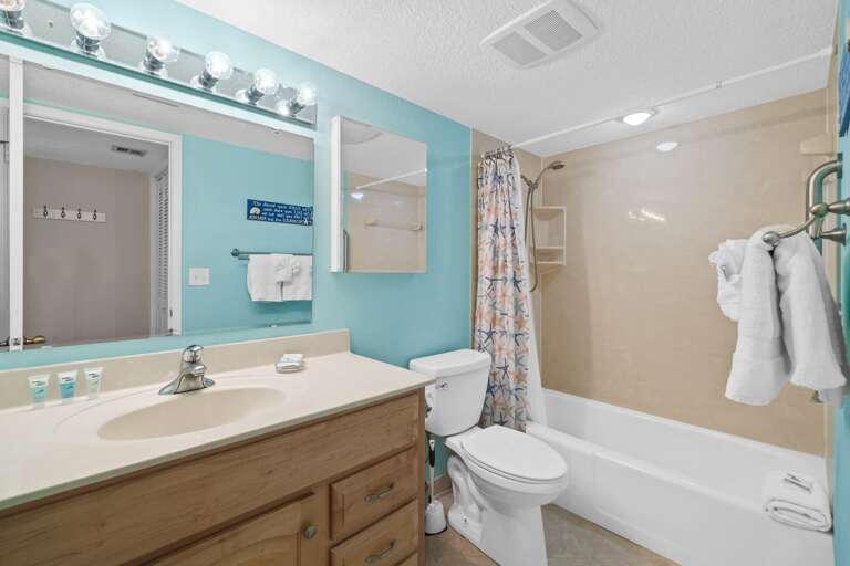 Featuring a shower/tub combo.