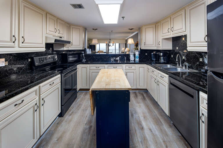There is ample space to move around with ease in this elegant kitchen. All major appliances are available for your use