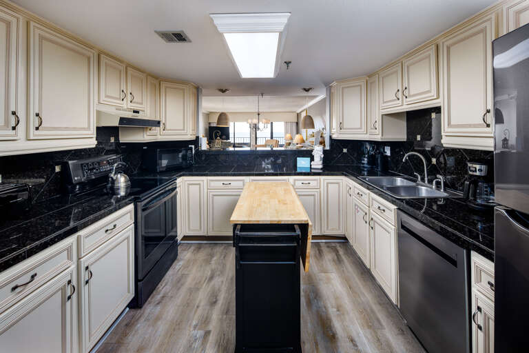 There is ample space to move around with ease in this elegant kitchen. All major appliances are available for your use