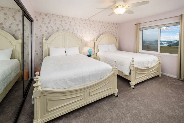 Beautiful pair of QUEEN sized beds! Perfect for your guests, also mirrored sliding doors to plenty of closet space!