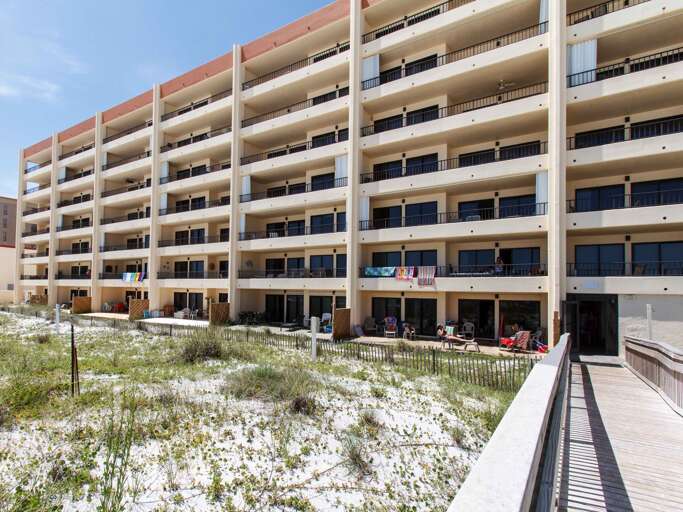 Sand dunes are protected so the wooden boardwalk conveniently allows all guests and owners of Surf Dweller direct access to the Gulf of Mexico