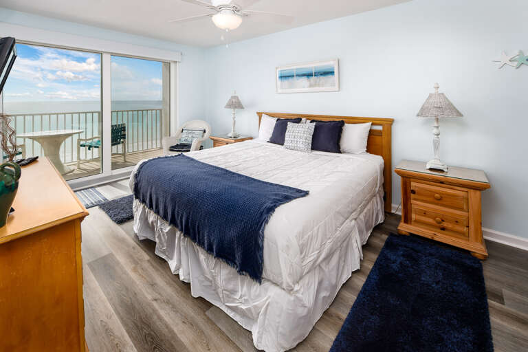 Large balcony doors let the sights and sounds of the Gulf encompass the master
bedroom.