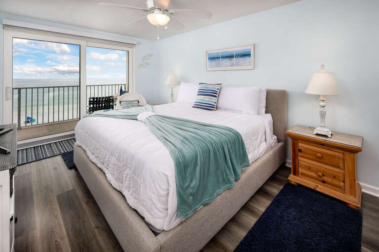Large balcony doors let the sights and sounds of the Gulf encompass the master
bedroom.