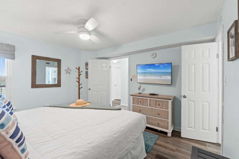 Contains a TV and spacious dresser for everyone's beach attire