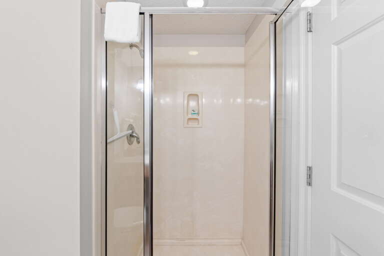 Featuring a walk in shower.