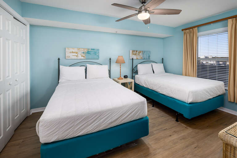 Direct entry to the full-size second bathroom. Upgrades continue with new comforters and furnishings.