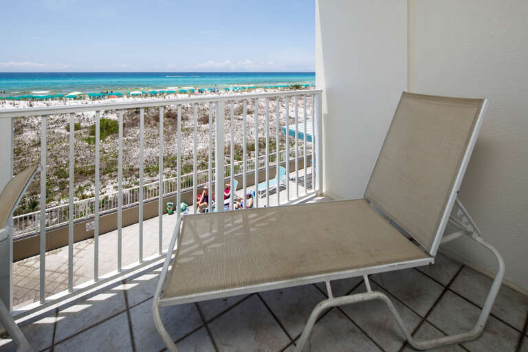 Relax and enjoy gulf views from this chaise lounge chair. Relax and enjoy gulf views from this chaise lounge chair.