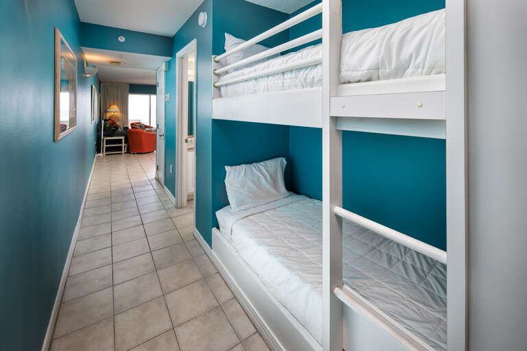 nestled into the wall these bunks provide additional sleeping for 2 - perfect for younger children