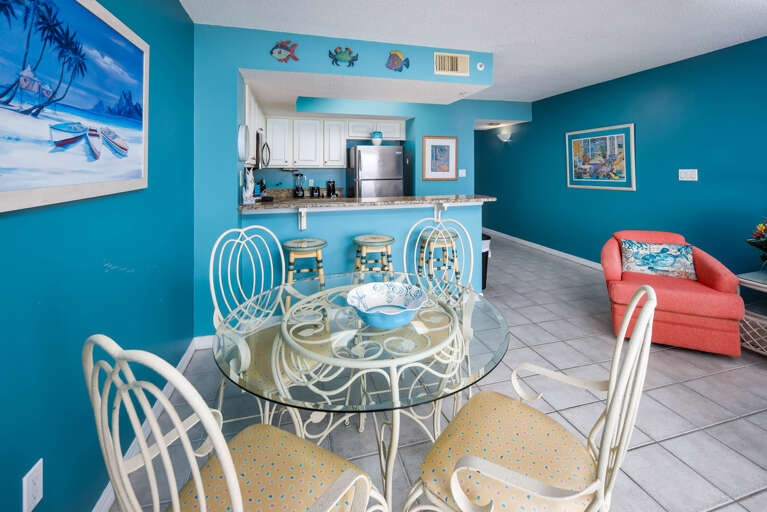 Beachy themed dining area - table that seats 4 plus 3 bar stools Beachy themed dining area - table that seats 4 plus 3 bar stools