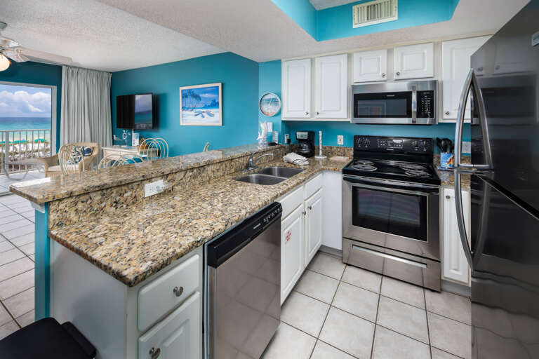 View of the kitchen with all stainless steel appliances