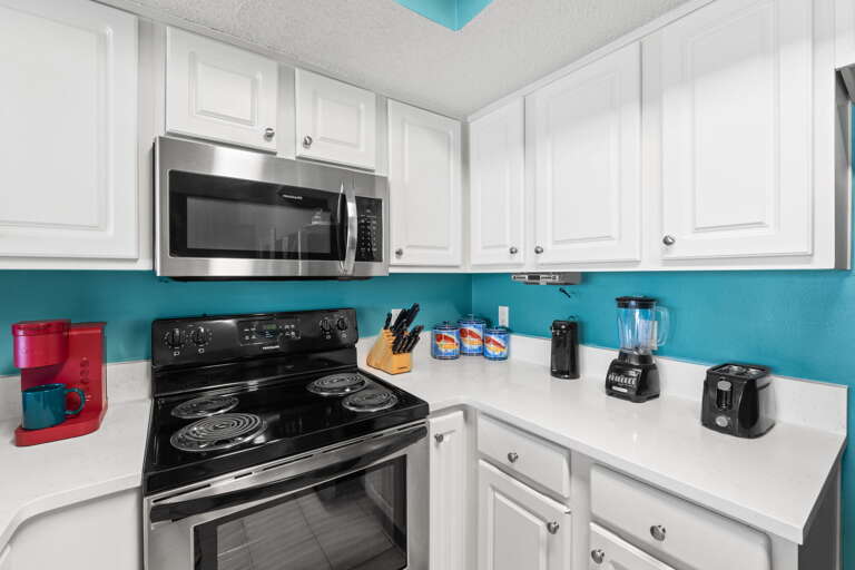 View of the kitchen with all stainless steel appliances
