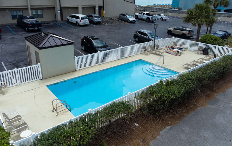 Float around in this fenced-in pool, located at the front of the building.