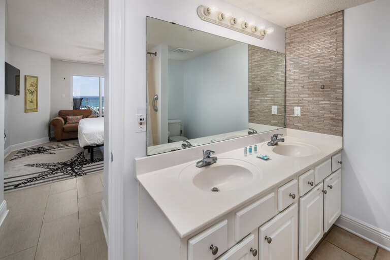 Nice vanity with lots of storage and a large mirror 