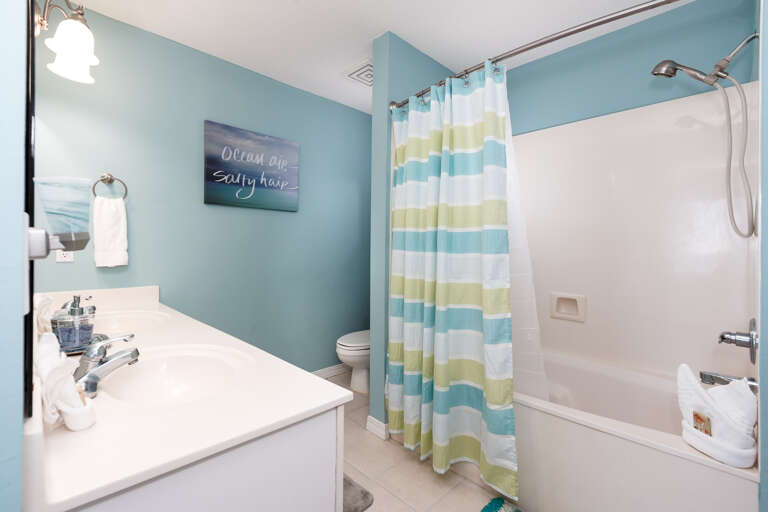 Captivating Master Bathroom features a tub/shower combo 