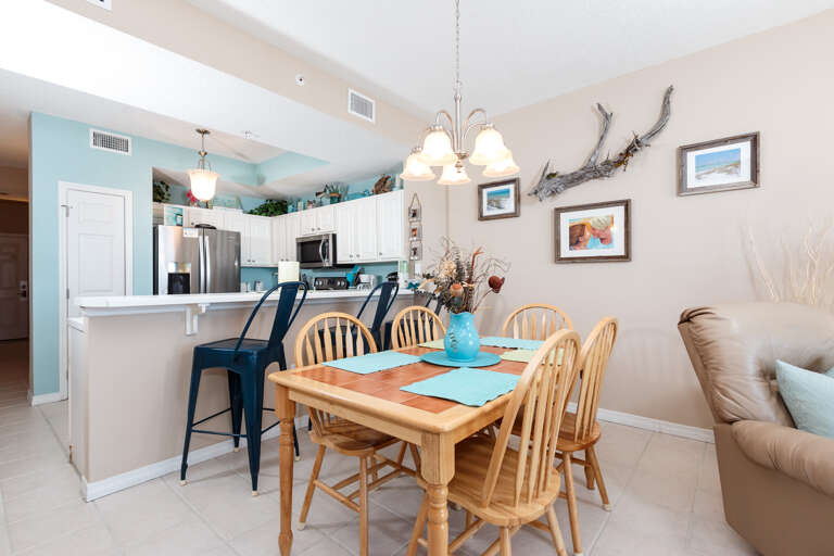 Enjoy your next family meal in this cozy dining set that can accommodate up to 5 guest, additional seating available at the Breakfast bar