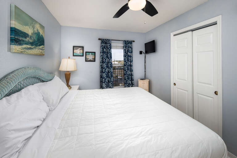 The lovely Guest Room has a king size bed, a sunny window, a flat screen TV and easy access to the guest bathroom.