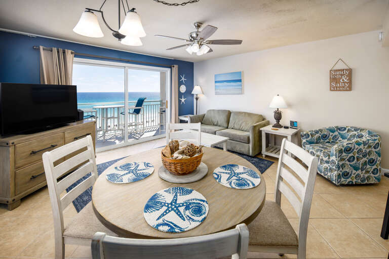 Seating for 4 at the dining table with additional seating at the kitchen island.