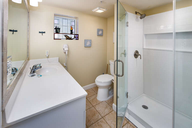 Featuring a walk in shower.