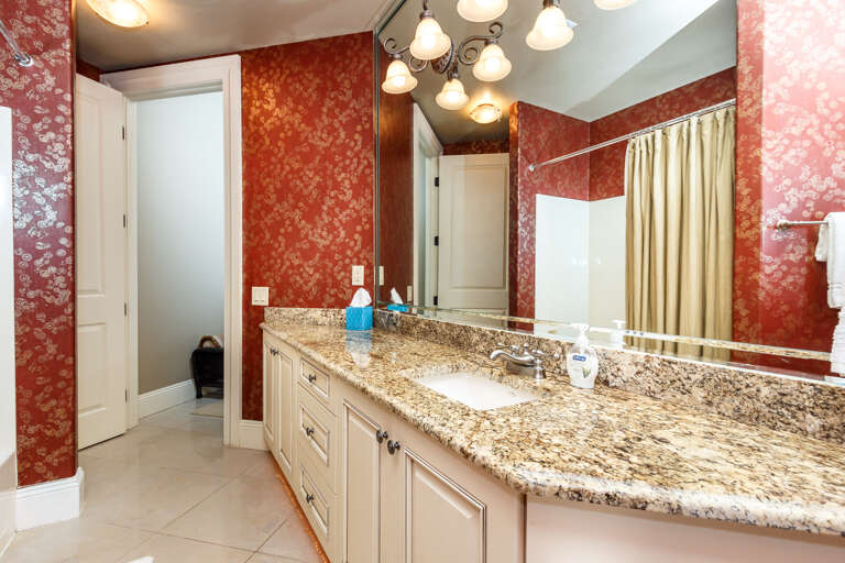 En suite bathroom for second guest bedroom exquisitely designed, ample space for prepping oneself for all occasions!