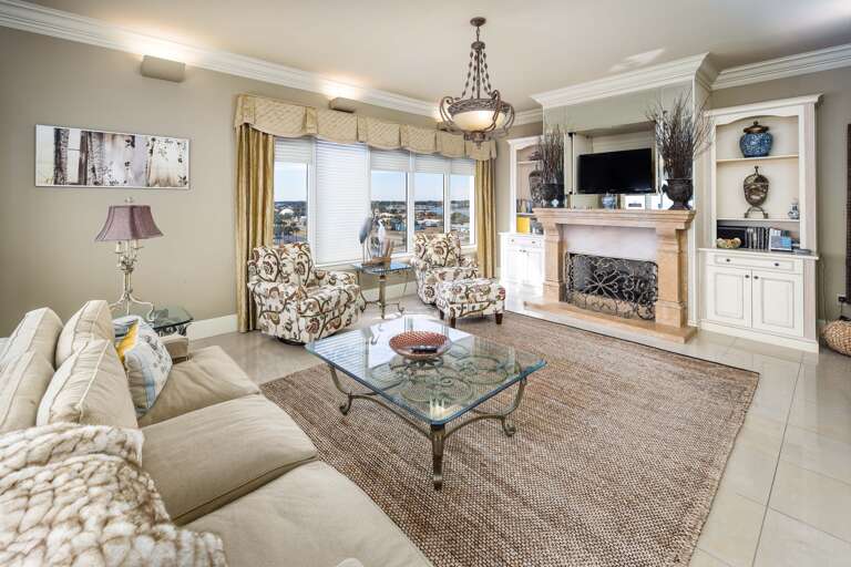 Crown molding, upgraded lighting, porcelain tile floor and plenty of sitting room for everyone in the family.