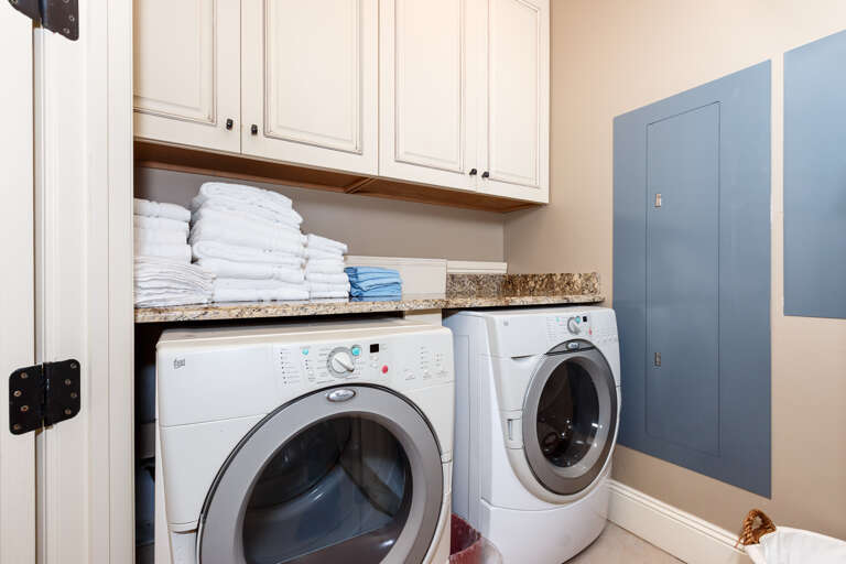 Upscale full-size washer and dryer for your convenience along with extra storage space!