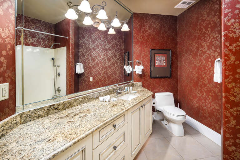 En suite bathroom for second guest bedroom exquisitely designed, ample space for prepping oneself for all occasions!