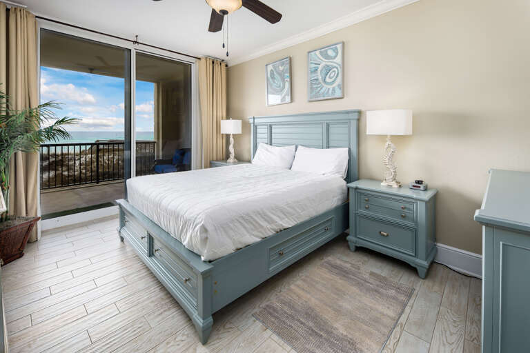 Charming primary bathroom with balcony access and direct access to a full bath with a walk-in shower and jacuzzi tub.