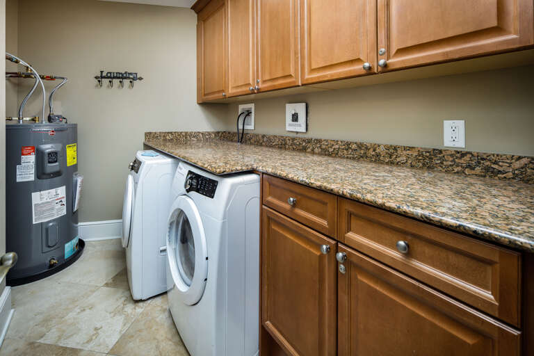 A spacious laundry room to get those bathing suits cleaned and ready for the next day! 