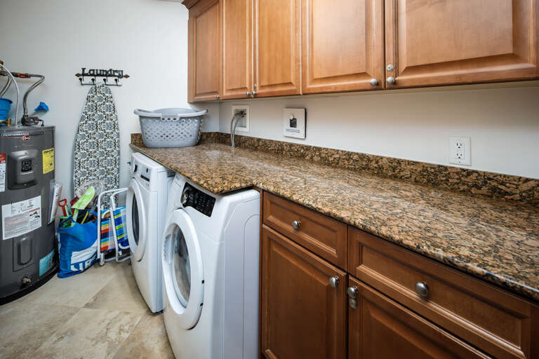 A spacious laundry room to get those bathing suits cleaned and ready for the next day! 