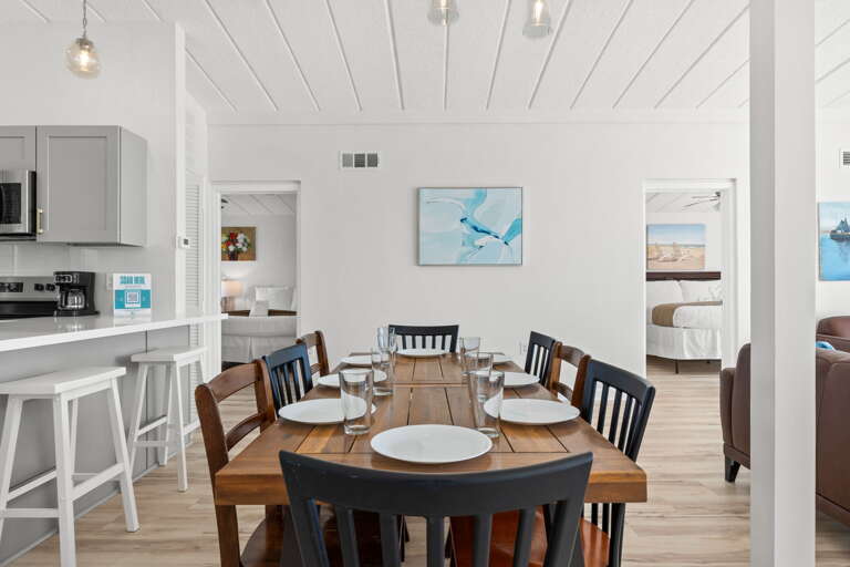 Seating for 8 with additional seating at the kitchen island.