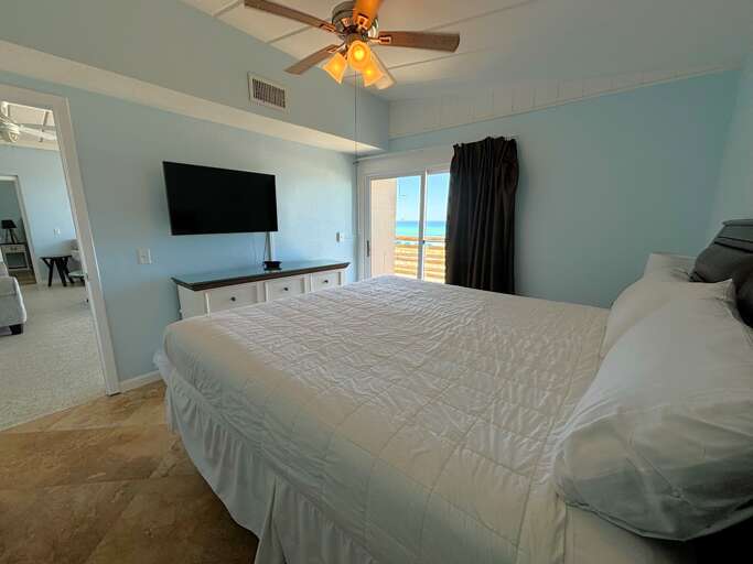 A lovely master bedroom with a comfy bed!