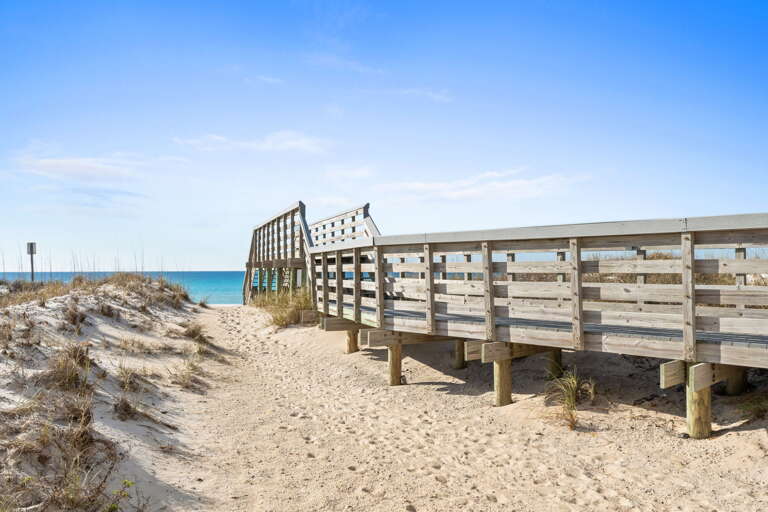 Boardwalk to the beach is located right next to the house.