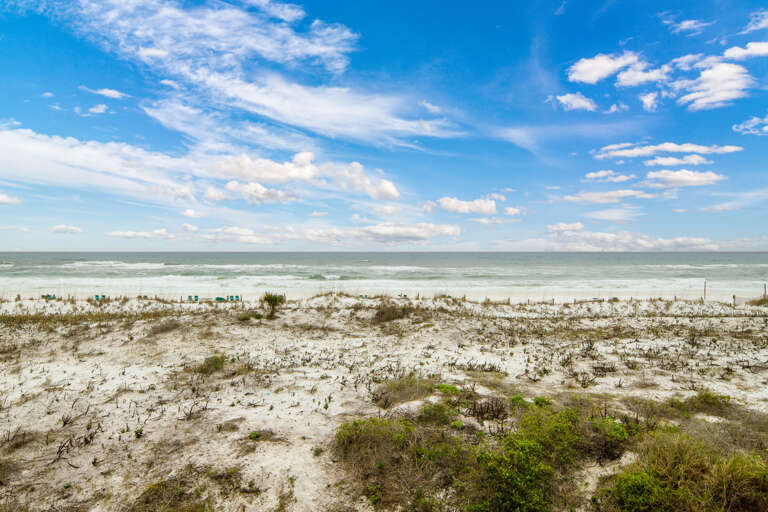 Picturesque views from the balcony of the Gulf of Mexico while sitting in the lovely teal poly-wood patio set; paradise awaits you!