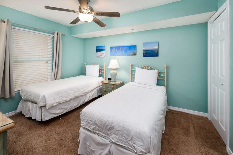 Third Guest bedroom with 2 twin size beds includes direct access to the third bathroom.