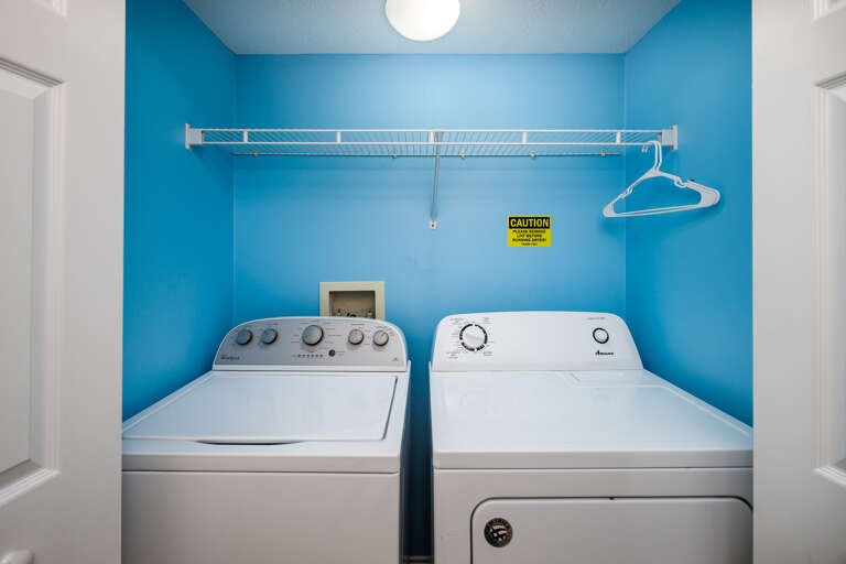 Laundry area with a full size washer and dryer ensures this unit has all the comforts of home.
