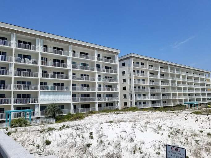 A view of the back side.  Notice the big balconies. A view of the back side.  Notice the big balconies.
