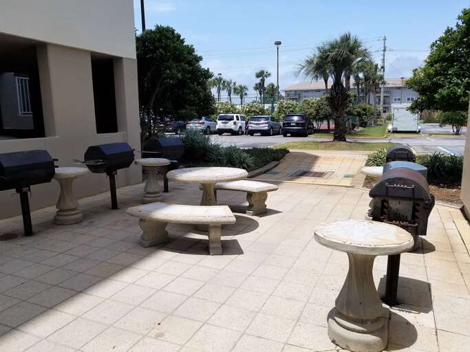 Community charcoal grills available for all Gulf Dunes guests