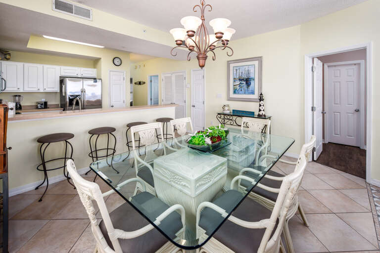 Dining area that will seat up to 10 with the bar stool area included.