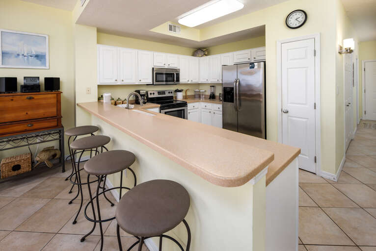 There is extra seating at the breakfast bar. 