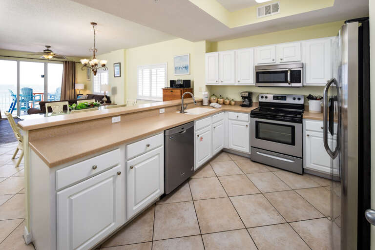 Make your favorite meals in this fully stocked kitchen with stainless steel appliances. 